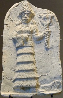 Ishtar holding double serpent wand. Terracotta relief, early 2nd millennium BCE. 